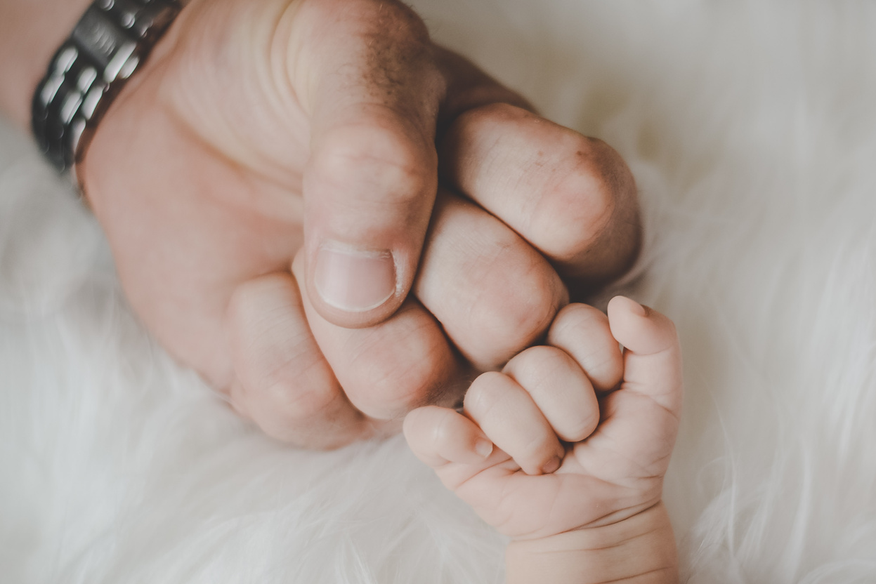 Father And Baby's Fist